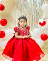 Red organza frock with white pearl embellishment