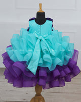 Aqua Blue And Purple Gown with Fluffy Layered Netted Bottom And Hand-Crafted Purple Flowers