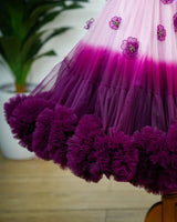 Plum purple and onion pink colour gradient heavy frill gown with hand crafted embellishments and layered sleeves