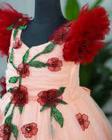 Maroon and peach double shade couturegown with frilled sleeves and handcrafted flowers and leaves