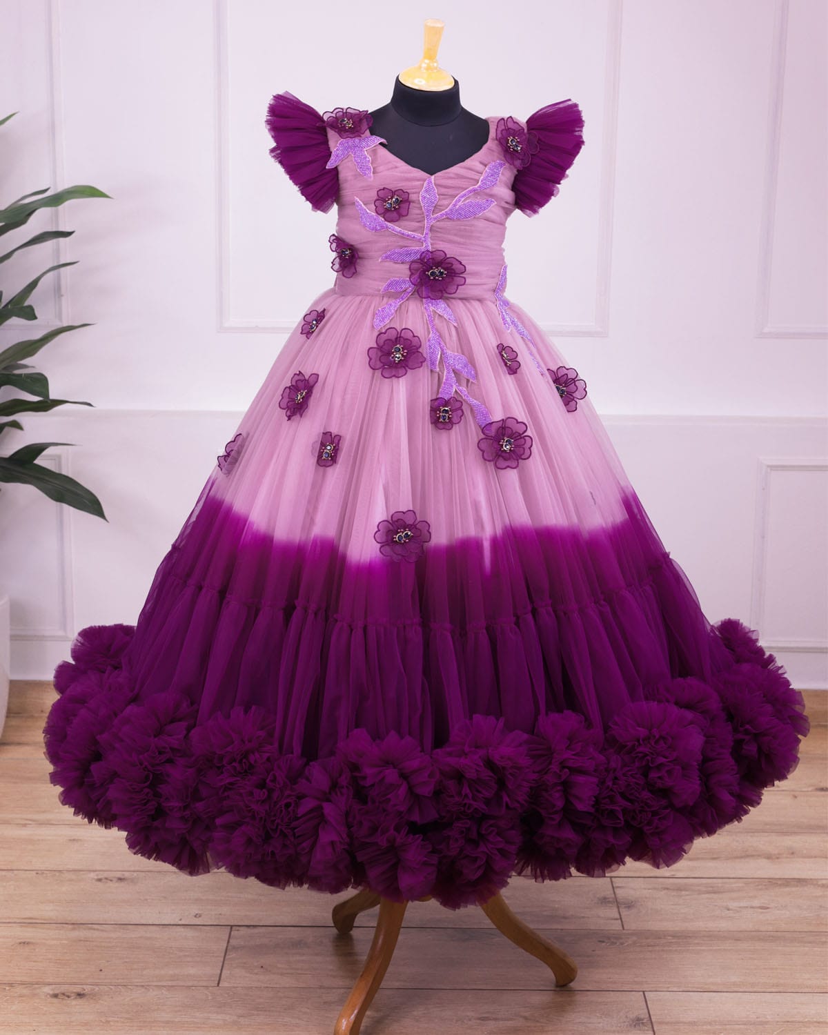 Plum purple and onion pink colour gradient heavy frill gown with hand crafted embellishments and frilled sleeves