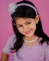 Pink lavender twirled gown with crystal and bead detailing