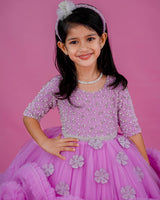 Pink lavender twirled gown with crystal and bead detailing