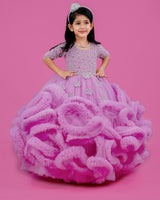 Pink lavender twirled gown with crystal and bead detailing