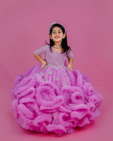 Pink lavender twirled gown with crystal and bead detailing