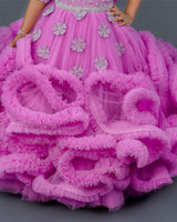 Pink lavender twirled gown with crystal and bead detailing