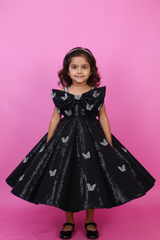 Black Sequence Panel Gown Highlighted with Handcrafted Silver Butterfly Patches.