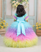 Multi shade Feather Frilled Gown With Rich Golden Bead Work Gown