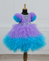 Lavender & Sky Blue Feather Frilled Gown With Rich Golden Bead Work Gown