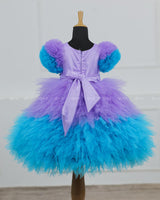 Lavender & Sky Blue Feather Frilled Gown With Rich Golden Bead Work Gown