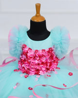 Moonlight- Pale turquoise Twirled Party wear Gown with pink Flowers.