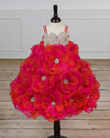 Pink and Orange Short Frock Highlighted with Hand Embellished Flower Petals.