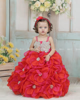 Pink and Orange Short Frock Highlighted with Hand Embellished Flower Petals.