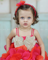 Pink and Orange Short Frock Highlighted with Hand Embellished Flower Petals.