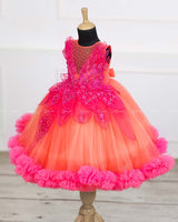 coral and fuchsia pink party wear gown with heavy and crafted yoke and petal detailing