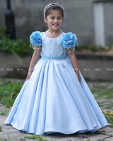 Dreamy Sky Blue Gown With Floral Puff Sleeves Adorned With Crystal Hangings, Handworked Belt And Long Veil.