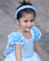 Dreamy Sky Blue Gown With Floral Puff Sleeves Adorned With Crystal Hangings, Handworked Belt And Long Veil.