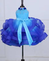 Baby Blue halter neck twirled couture gown with royal blue flowers embellishments.