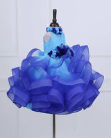 Baby Blue halter neck twirled couture gown with royal blue flowers embellishments.