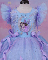 A dreamy lilac-blue fairy gown with butterfly details, side bows, and sparkling ruffles.