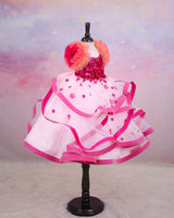 Dusty Peach Twirled Partywear Gown with Pink and Purple Small Flower