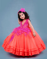 coral and fuchsia pink party wear gown with heavy and crafted yoke and petal detailing