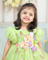 Pea Green Fairy Tale Dress Highlighted with Flowers