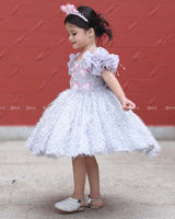 Misty Grey Feather Frock With Heavy Handworked Yoke And Draped Sleeve With Hanging Tassels