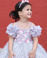 Misty Grey Feather Frock With Heavy Handworked Yoke And Draped Sleeve With Hanging Tassels