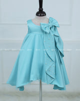 Sleeveless Aqua Frock With A Pearl-Detailed Bow And Flared Hem