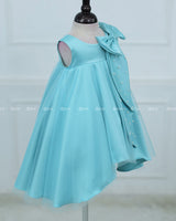 Sleeveless Aqua Frock With A Pearl-Detailed Bow And Flared Hem