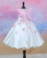 Milky White Satin Frock With A Pink Butterfly Bodice And 3D Floral Accents, Perfect For A Fairy-Tale Look