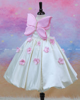 Milky White Satin Frock With A Pink Butterfly Bodice And 3D Floral Accents, Perfect For A Fairy-Tale Look