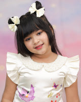 Cream Peter Pan Collar Dress With Cartoon Print And Frilled Sleeves.