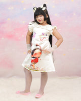 Cream Peter Pan Collar Dress With Cartoon Print And Frilled Sleeves.