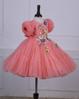 Blush Peach Fairy Tale Dress Highlighted with Flowers.