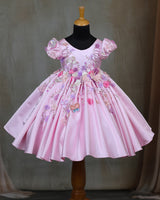 Elegant pink floral frock with puff sleeves and handworked butterfly