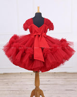 Red frilled tulle gown with designer black waist belt