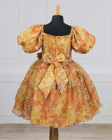 Mustard yellow color printed frock with designed bow detailing