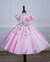 Baby pink floral frock with puff sleeves and handworked butterfly with bow