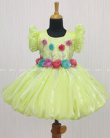 Baby Green Balloon Gown with Handcrafted Rose Embellishment.