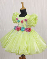 Baby Green Balloon Gown with Handcrafted Rose Embellishment.