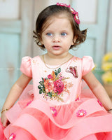Pink-Orange Layered Frock With Floral Yoke And 3D Flower Detailing.
