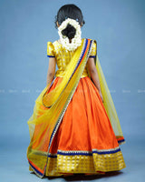 Yellow brocade with orange and navy blue combo lehanga set