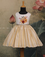 Ivory Frock With Floral-Printed Yoke, Sequin Highlights, Lace Waist, And Pleated Striped Flare