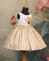 Ivory Frock With Floral-Printed Yoke, Sequin Highlights, Lace Waist, And Pleated Striped Flare