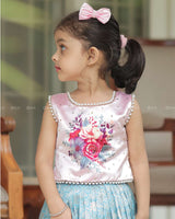 Sleeveless Pink Top With Floral Print And Pearls, Paired With Pleated Blue Brocade Skirt And Golden Lace Hem