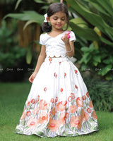 White Scallop Top With Pearl Beads, Paired With A Floral Poppy Print Skirt -C