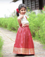 Floral Halter Top With Pearl Detailing, Paired With Red Brocade Skirt