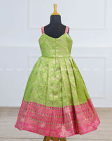 Lotus theme green brocade gown with lotus petal peplum hand crafted top